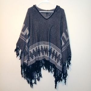 Knitted poncho with hood